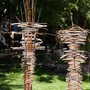 “Stick Totems” (<a href='/inquire.php?gallery=sculpture&file=stick_totems_8.jpg&caption=Stick Totems'>Inquire about this piece</a>)<br />info: steel wood / 8'<br />price: por